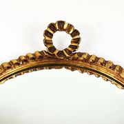 Round wall mirror in gilded wood, mid-century, C. Allodi & G. Subelli, Italy, 1950s.