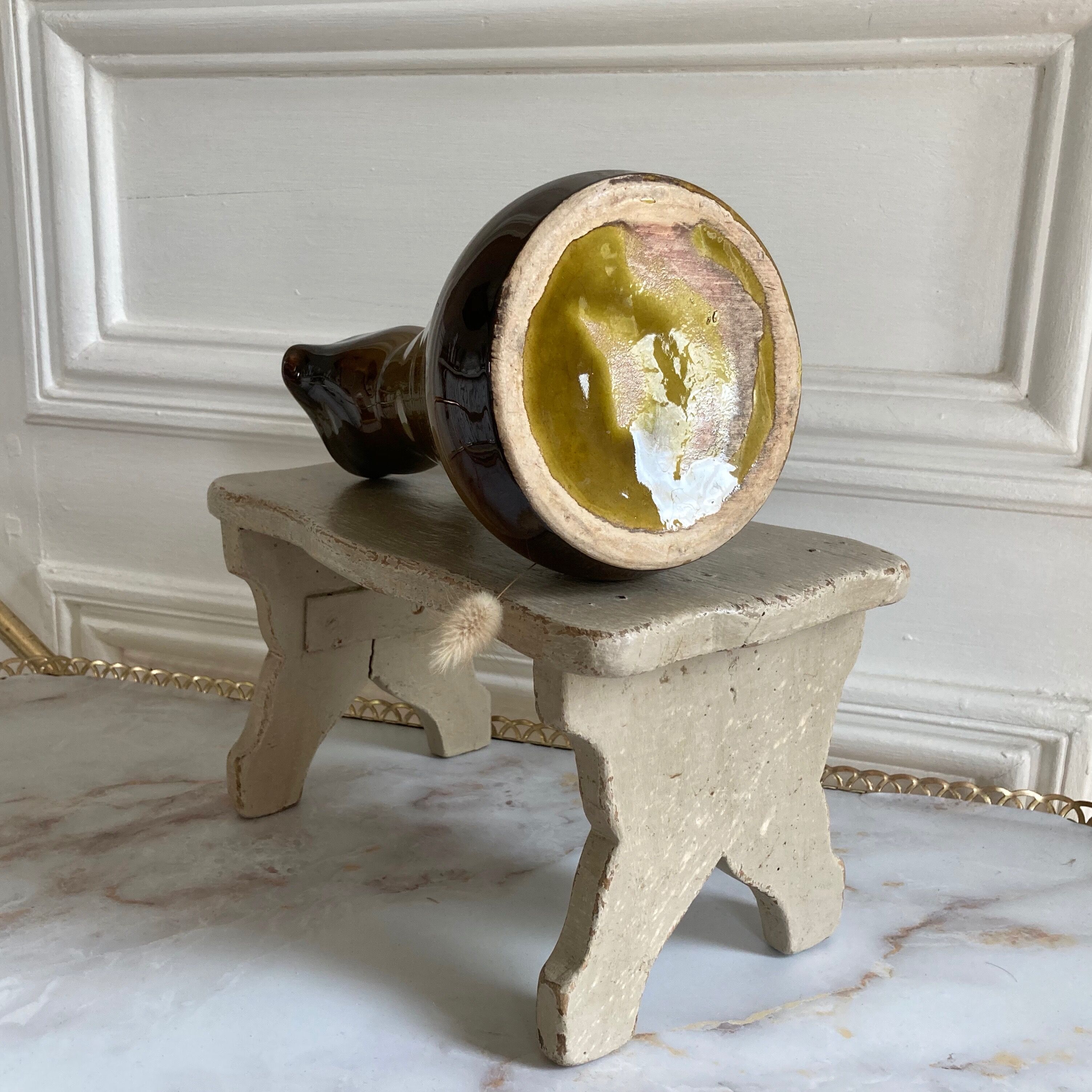 Set of three glazed ceramic pitchers