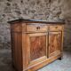 French Louis Philippe walnut buffet with black marble top, France, circa 1840–1860.