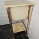 Bedside table in patinated iron, brass and marble tops