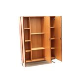 High vintage rosewood cupboard / wardrobe made in the 70s