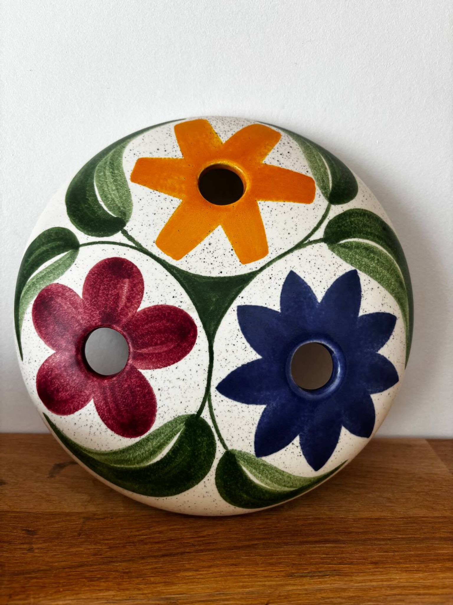 Charming vintage ceramic flower vase with floral decoration from the 1970s.
