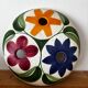 Charming vintage ceramic flower vase with floral decoration from the 1970s.