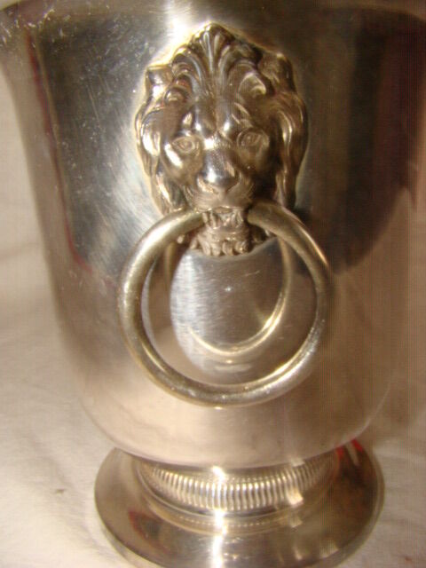 silver-plated ice bucket "with lion heads" from the 1970s