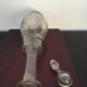 Art Deco stylized flowers carafe with its cap