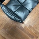 Chair with armrests by Kristian Solmer Vedel