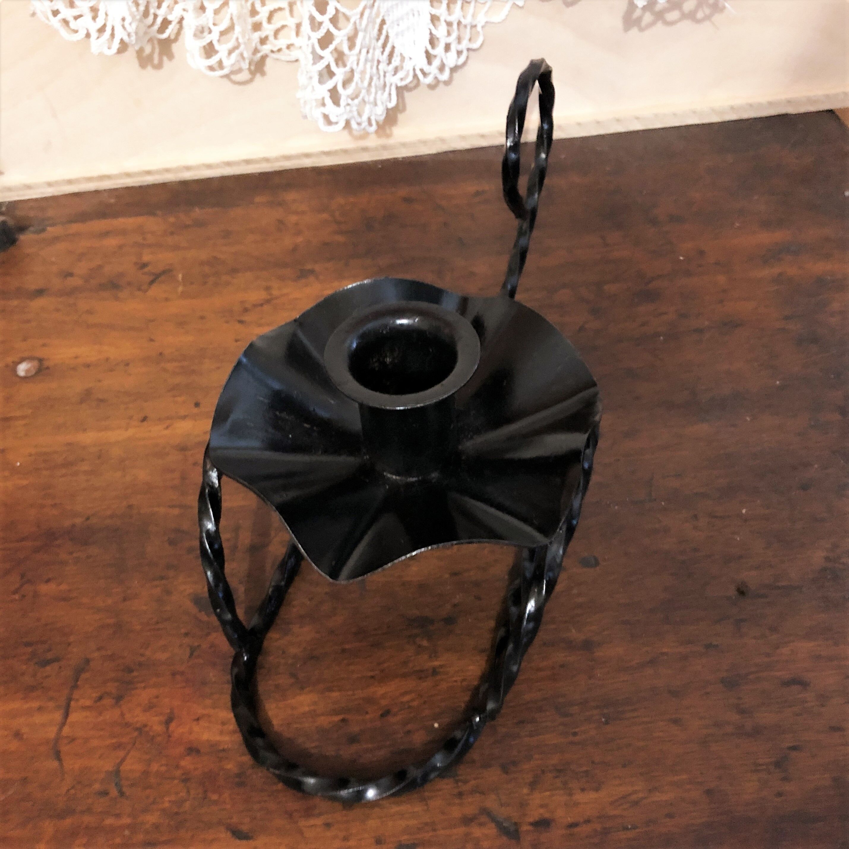 Handmade hand candle holder in vintage black wrought iron