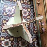 A rough wooden stool patinated by time