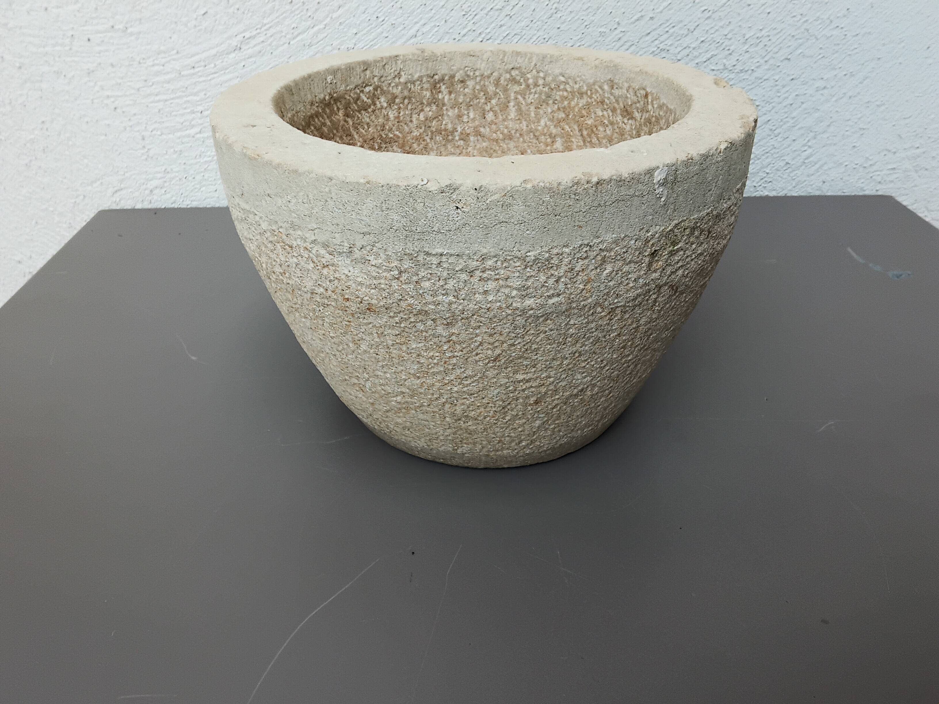 Stone mortar with wooden pestle