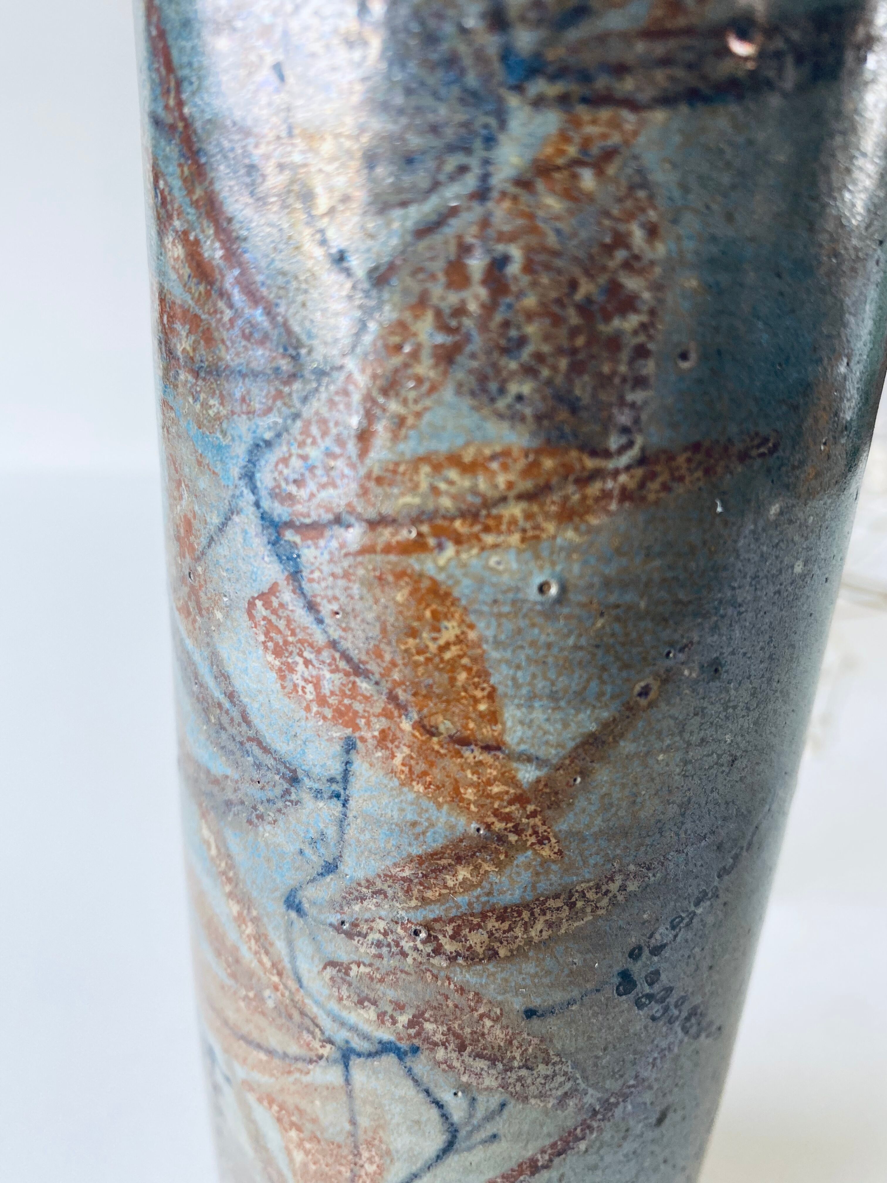 Signed ceramic tubular vase