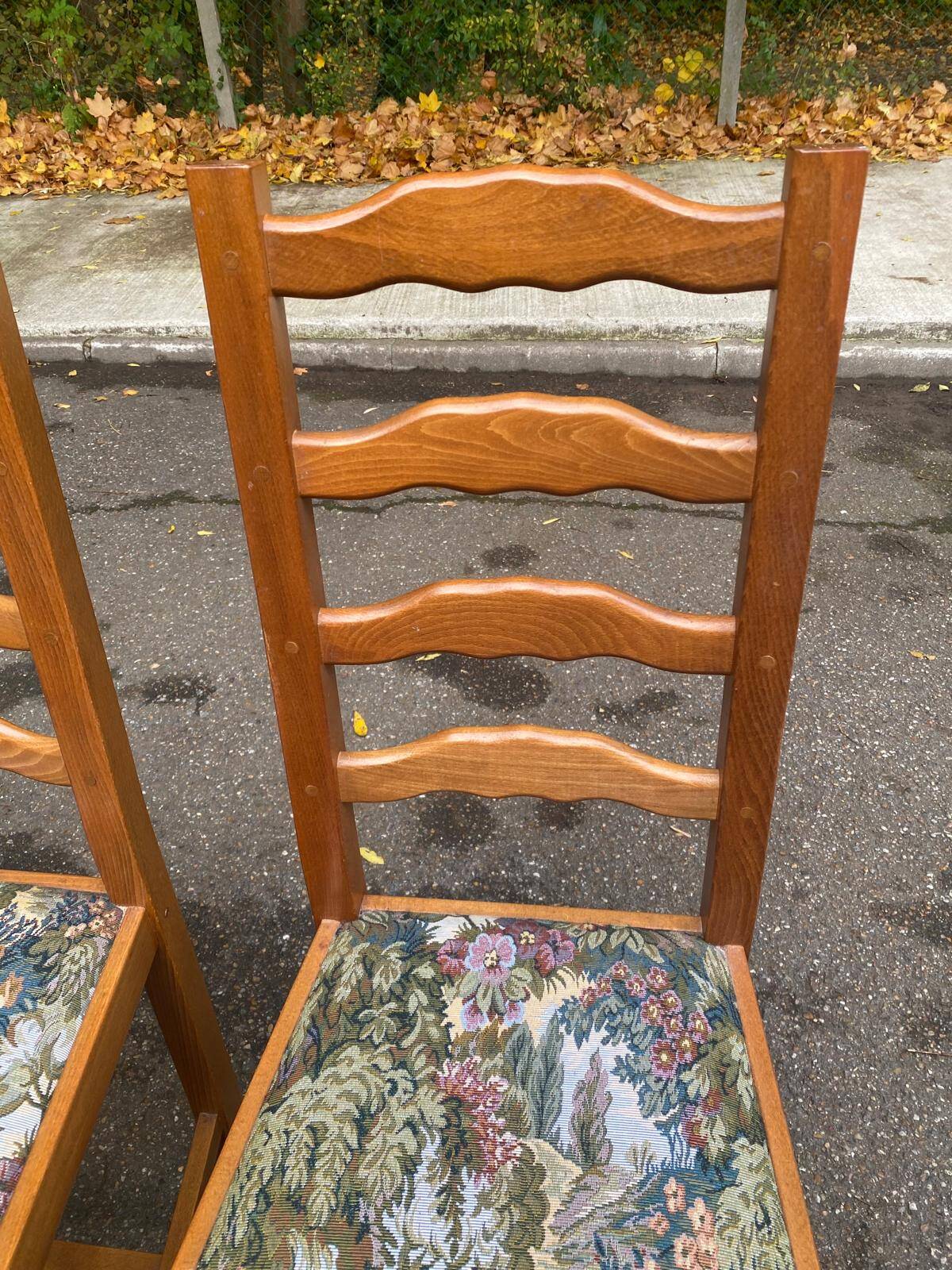 3 solid wood chairs with embroidered fabric