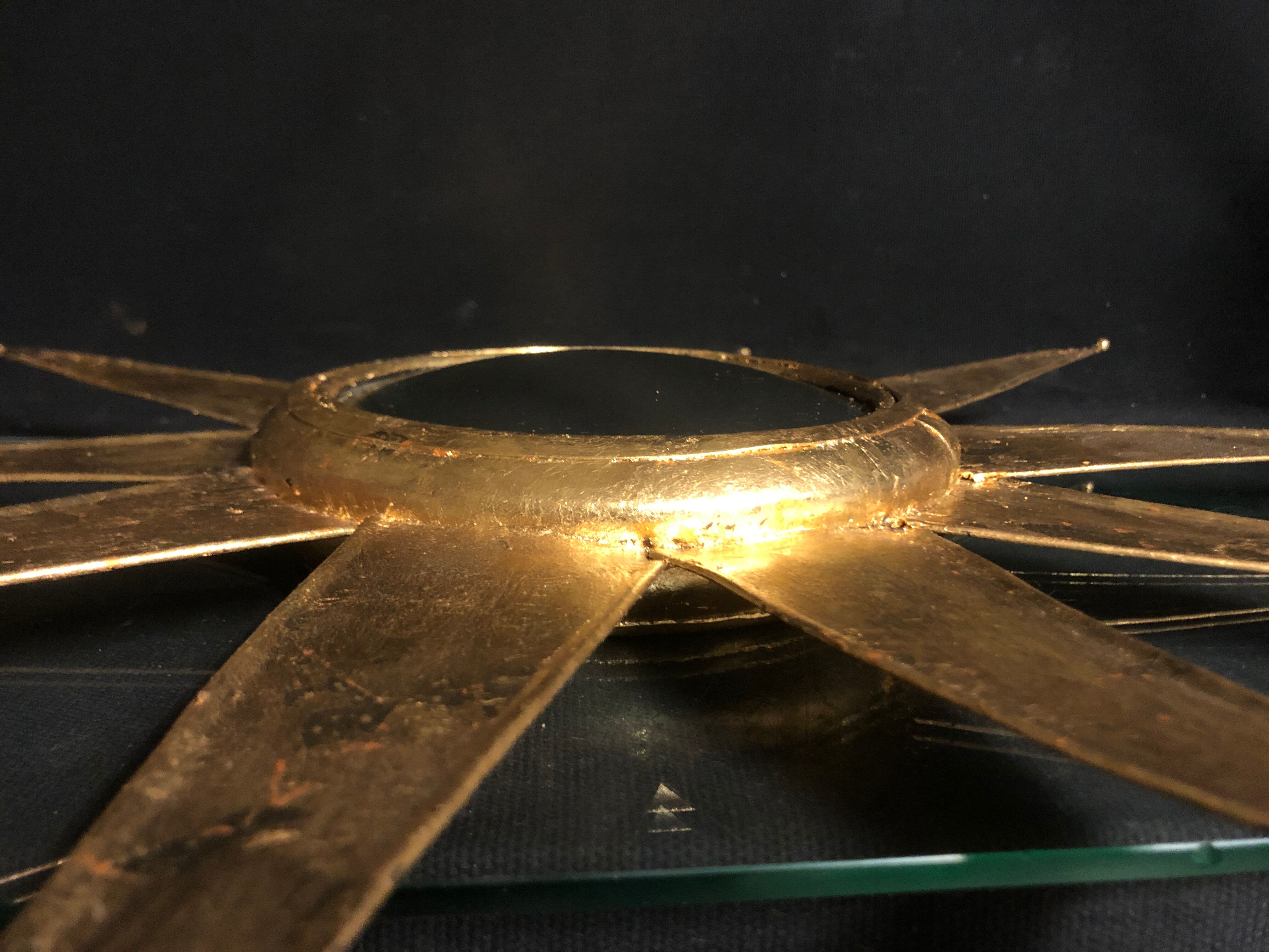 Mirror sun deforming 61 cm in gold metal with gold leaf said witch