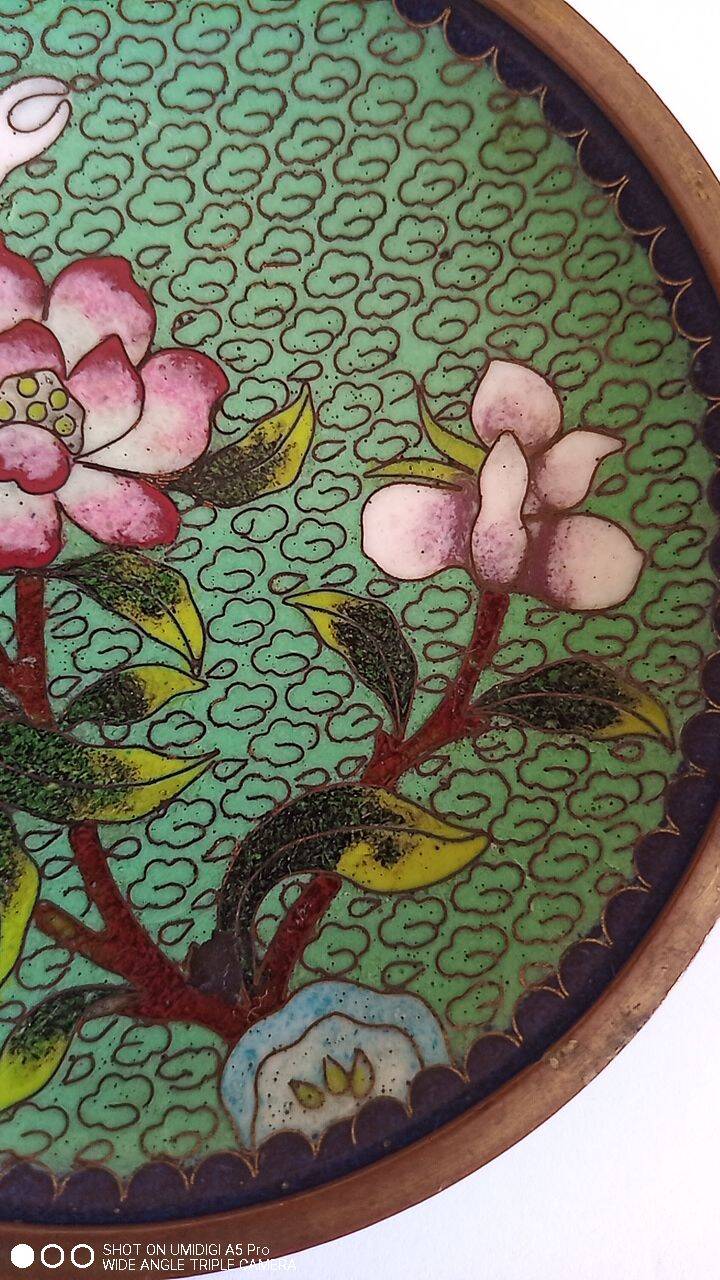 Spelter cup with flower decoration