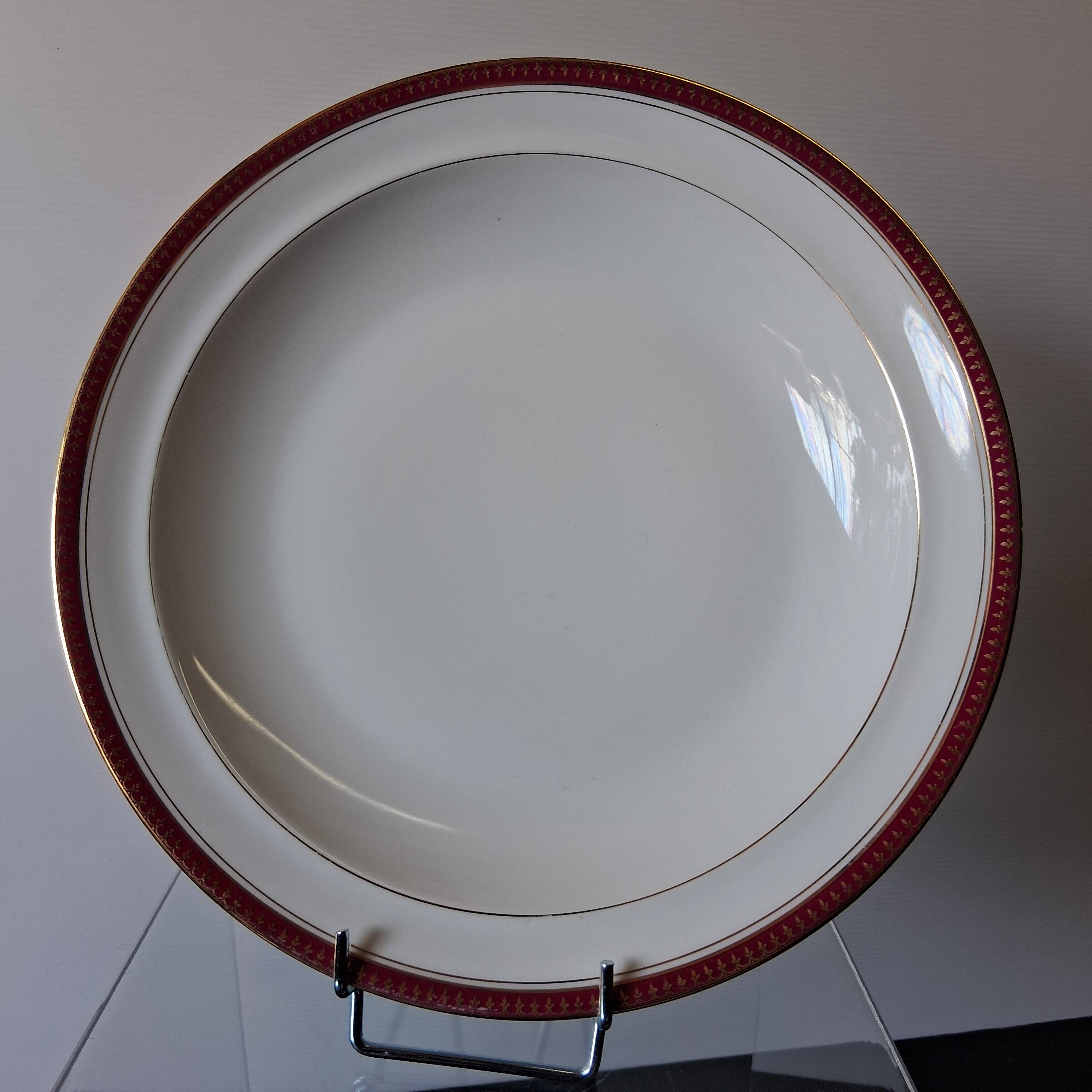 Round hollow serving plate in porcelain from Chastagner et Cie in good condition.