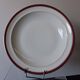 Round hollow serving plate in porcelain from Chastagner et Cie in good condition.