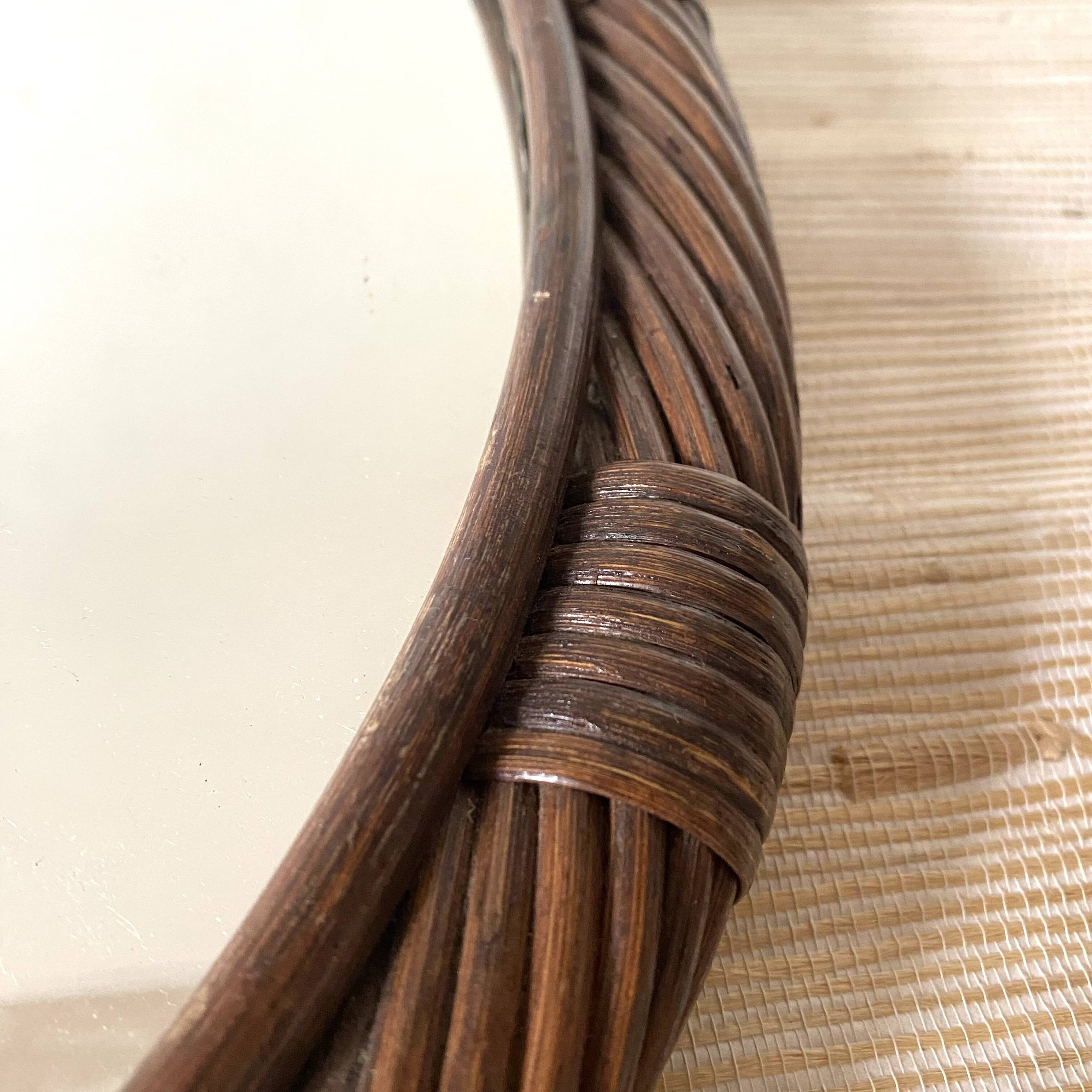 Oval rattan mirror