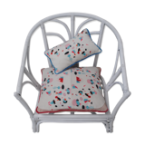 Armchair in rattan with its 2 cushions