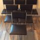 Set de 6 chaises vintage 70 piétement chrome assise Skaï noir