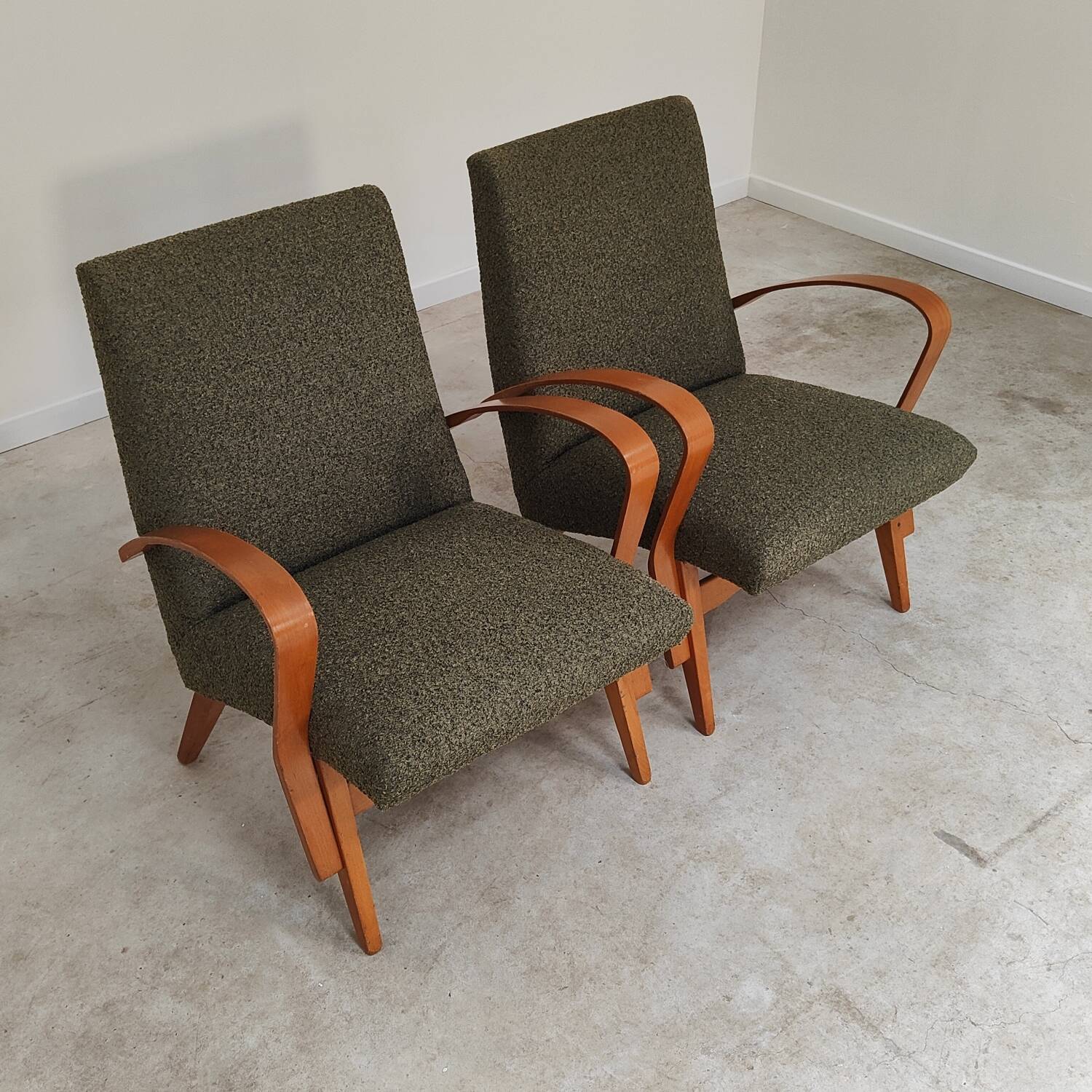 Pair of lounge chairs restored by Frantisek Jirak for Tatra