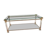 Glass lounge table with brass frame and plexiglass years 1980