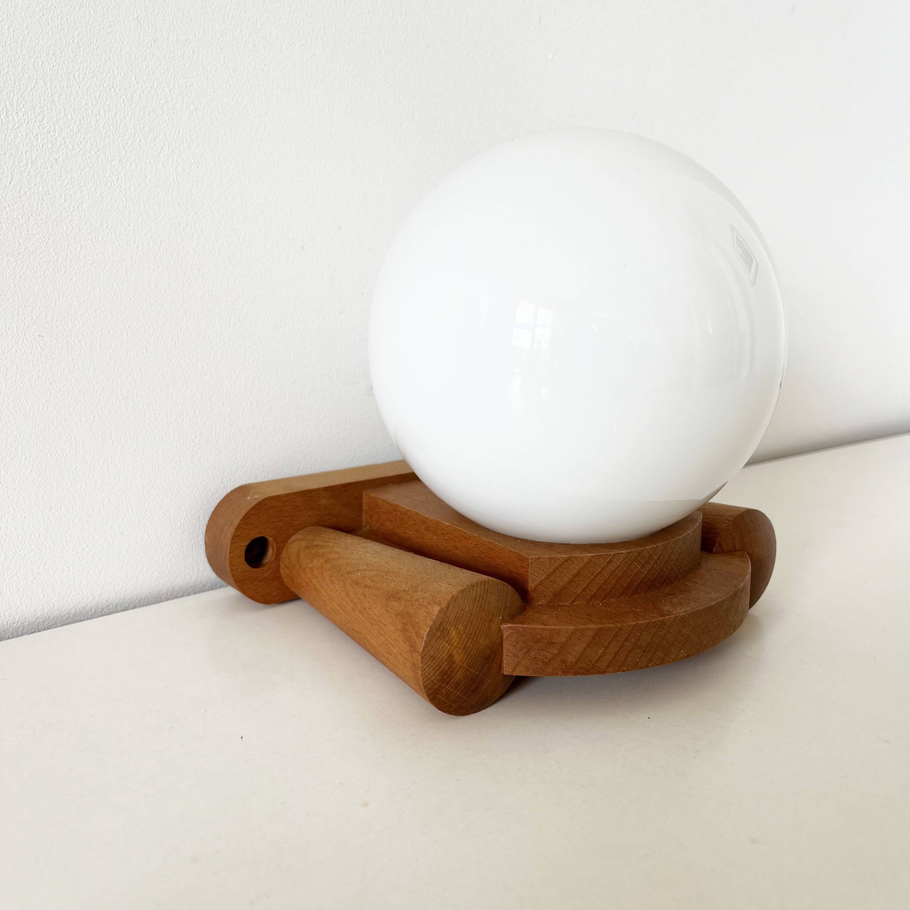 Tissot wall lamp in wood and opaline globe 1960