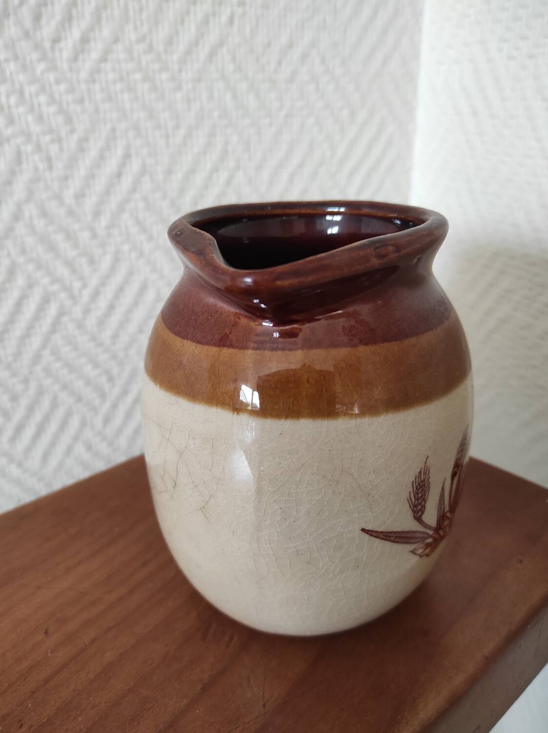 Glazed ceramic pitcher