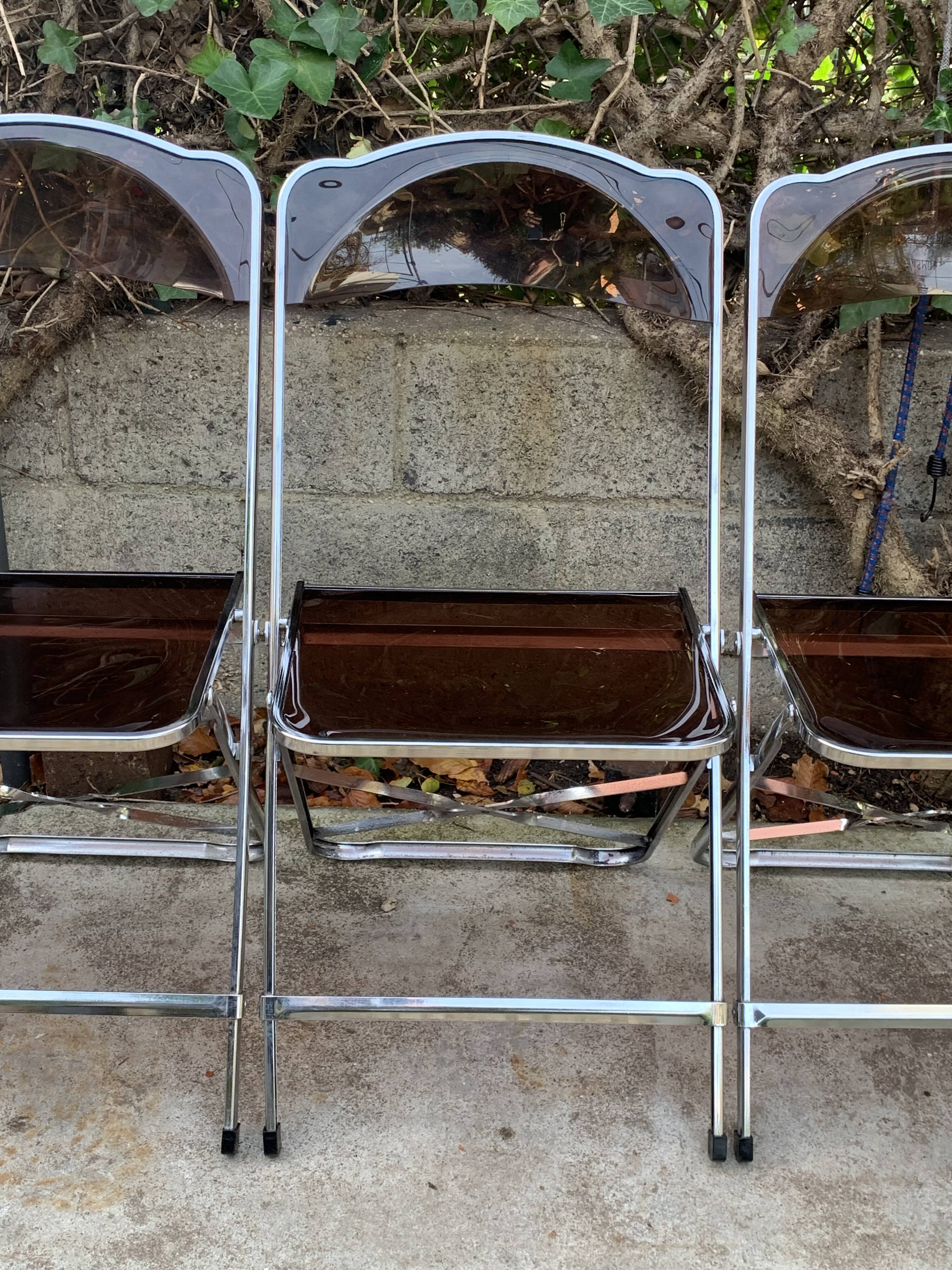 6 chaises pliantes en Plexiglas fumé et métal chrome Chaisor 1970