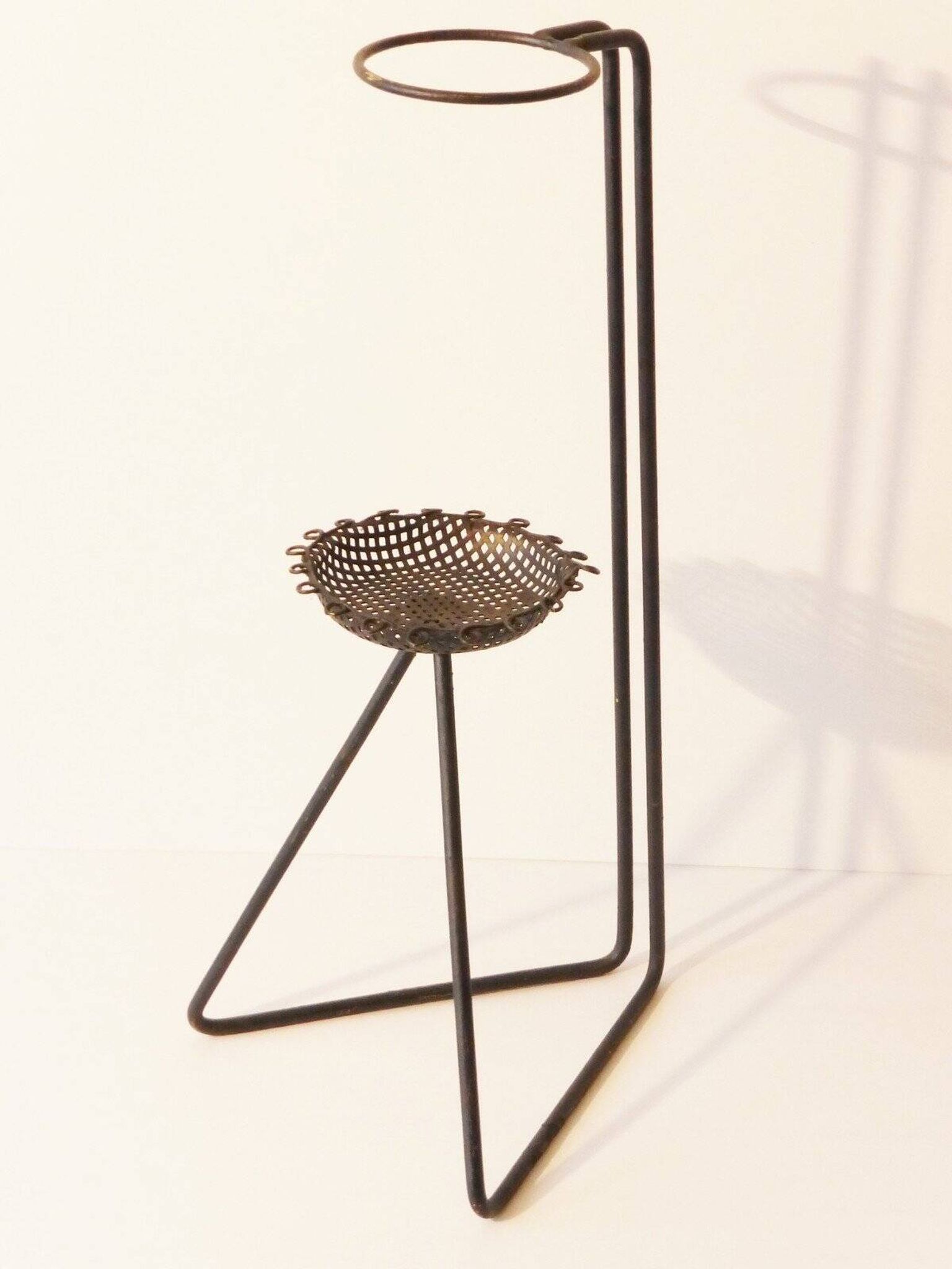 Perforated metal ashtray from the 1950s, vintage Rockabilly.