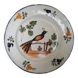 Old ceramic plate, hand-decorated, signed: bird on a fence.