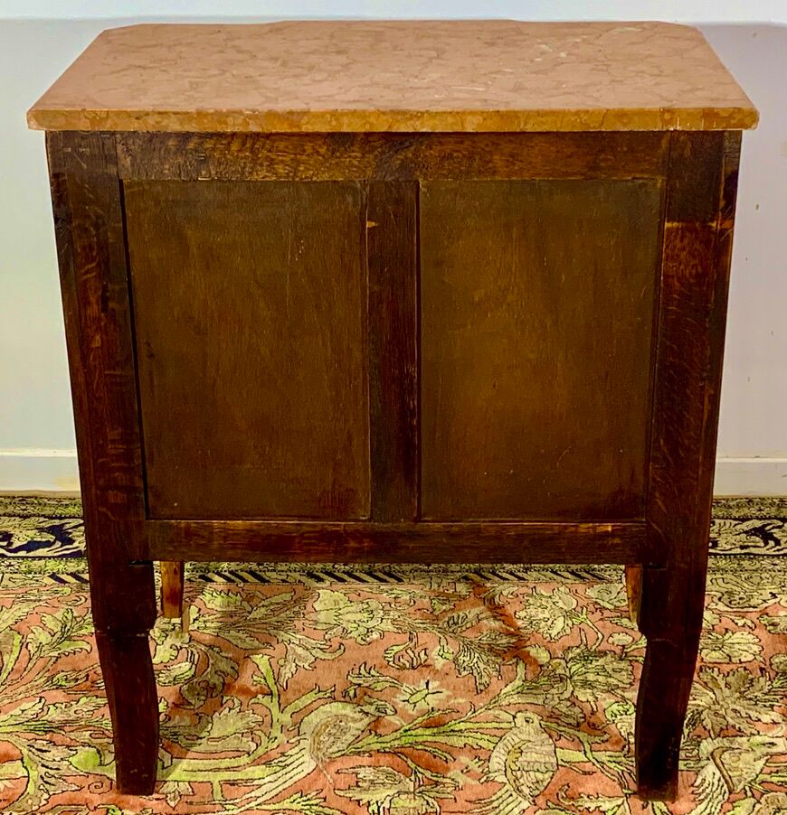 Transition style chest of drawers in rosewood and violet wood, ebony and gilded bronzes
