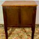 Transition style chest of drawers in rosewood and violet wood, ebony and gilded bronzes