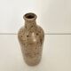 Pyrite stoneware single-flower vase in the shape of a bottle signed Aular?