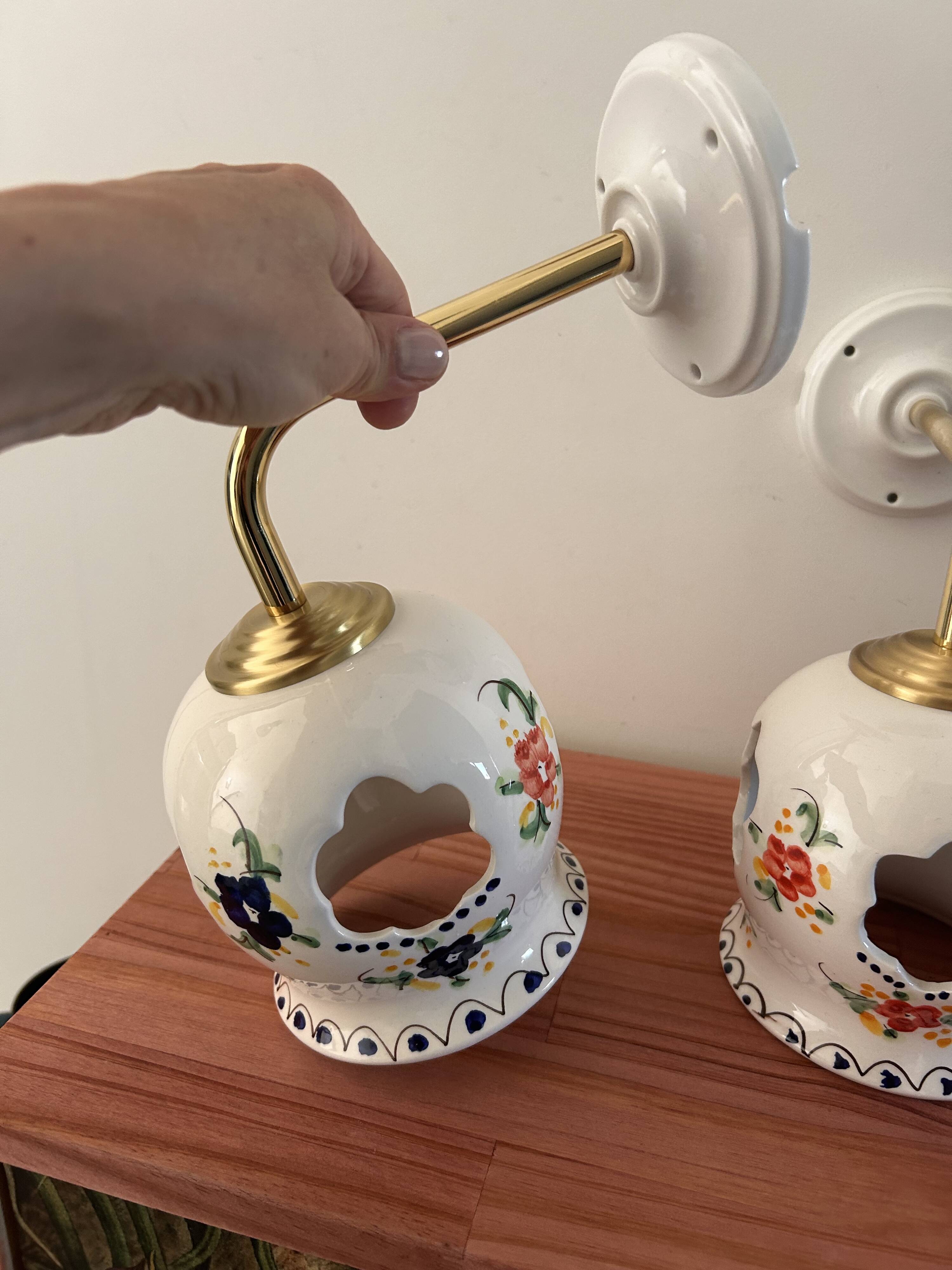 Pair of openwork ceramic wall lights