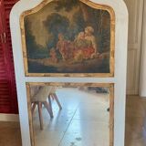 TRUMEAU Louis XVI, Large Model, in gilded wood from the 19th century