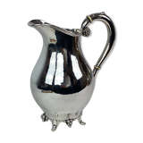 Water jug on feet decorated with ebony of hallmarked silver from the 1940s. The jug is in great anti