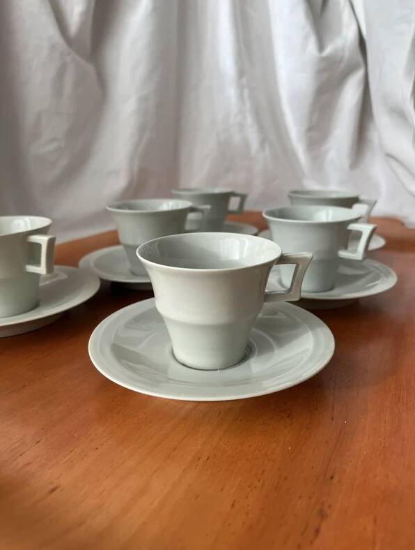 Art Deco cups and saucers by Théodore Haviland in celadon.