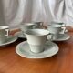 Art Deco cups and saucers by Théodore Haviland in celadon.