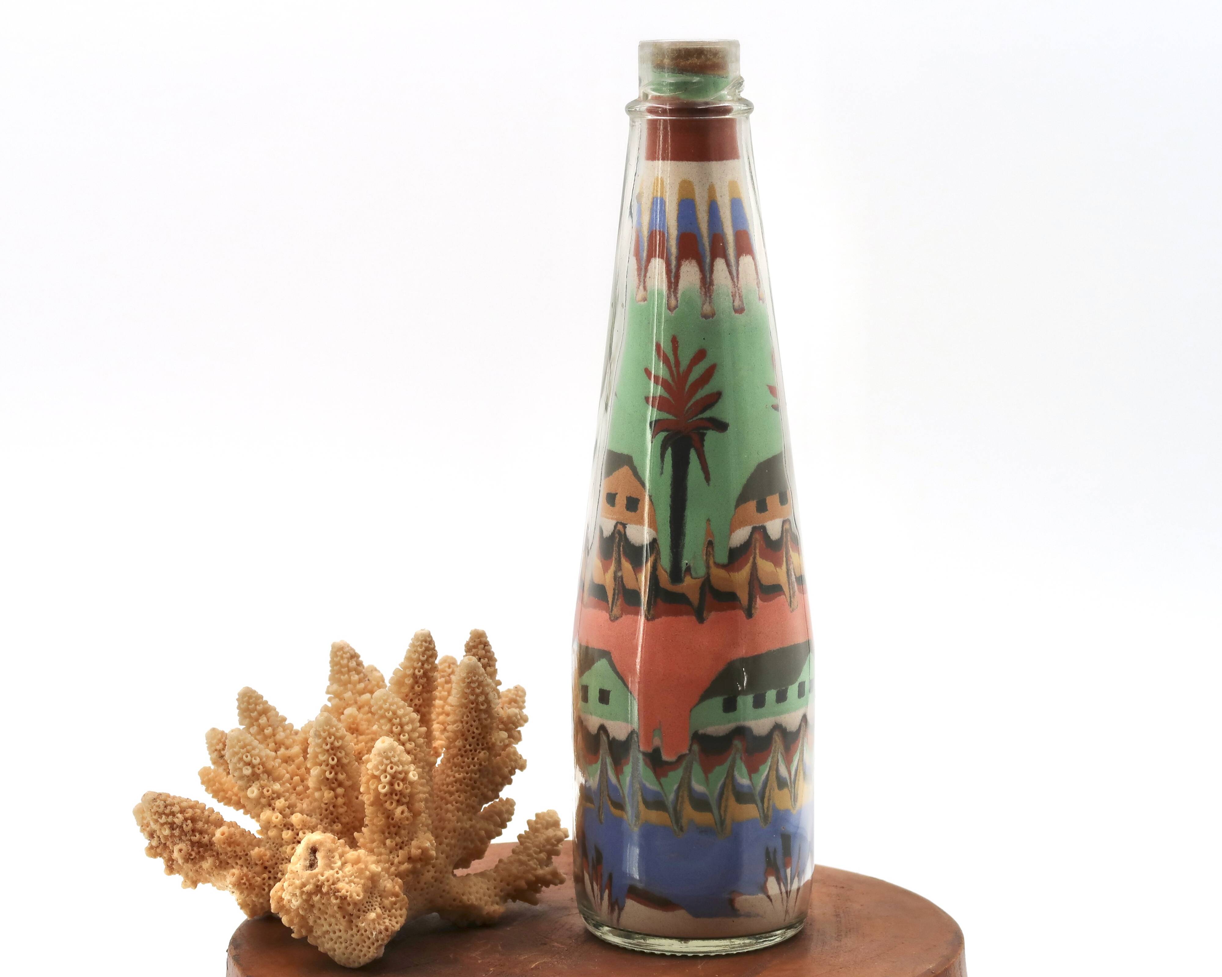 Glass bottle with coloured sand, South America 1970s