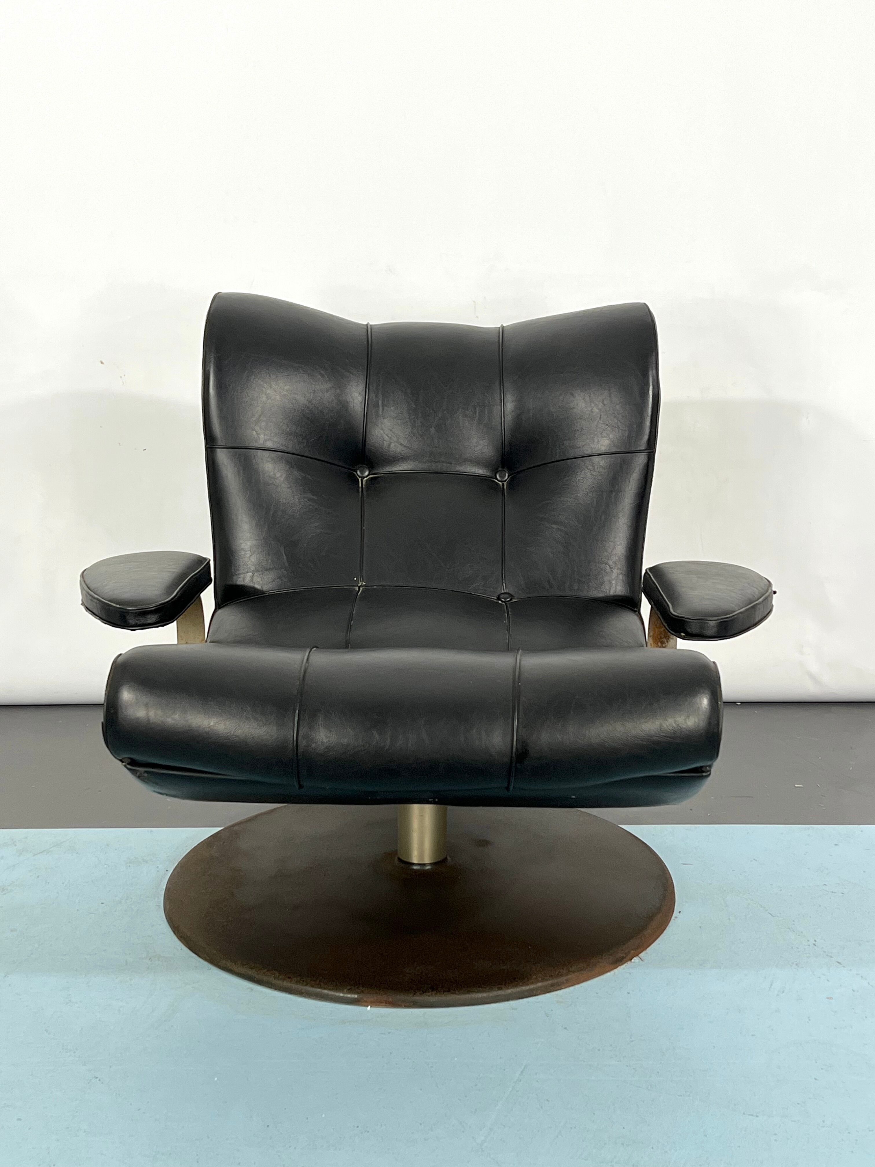 Vintage Italian black swivel armchair from 60s
