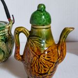 Set of old teapots and honey pot