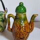Set of old teapots and honey pot