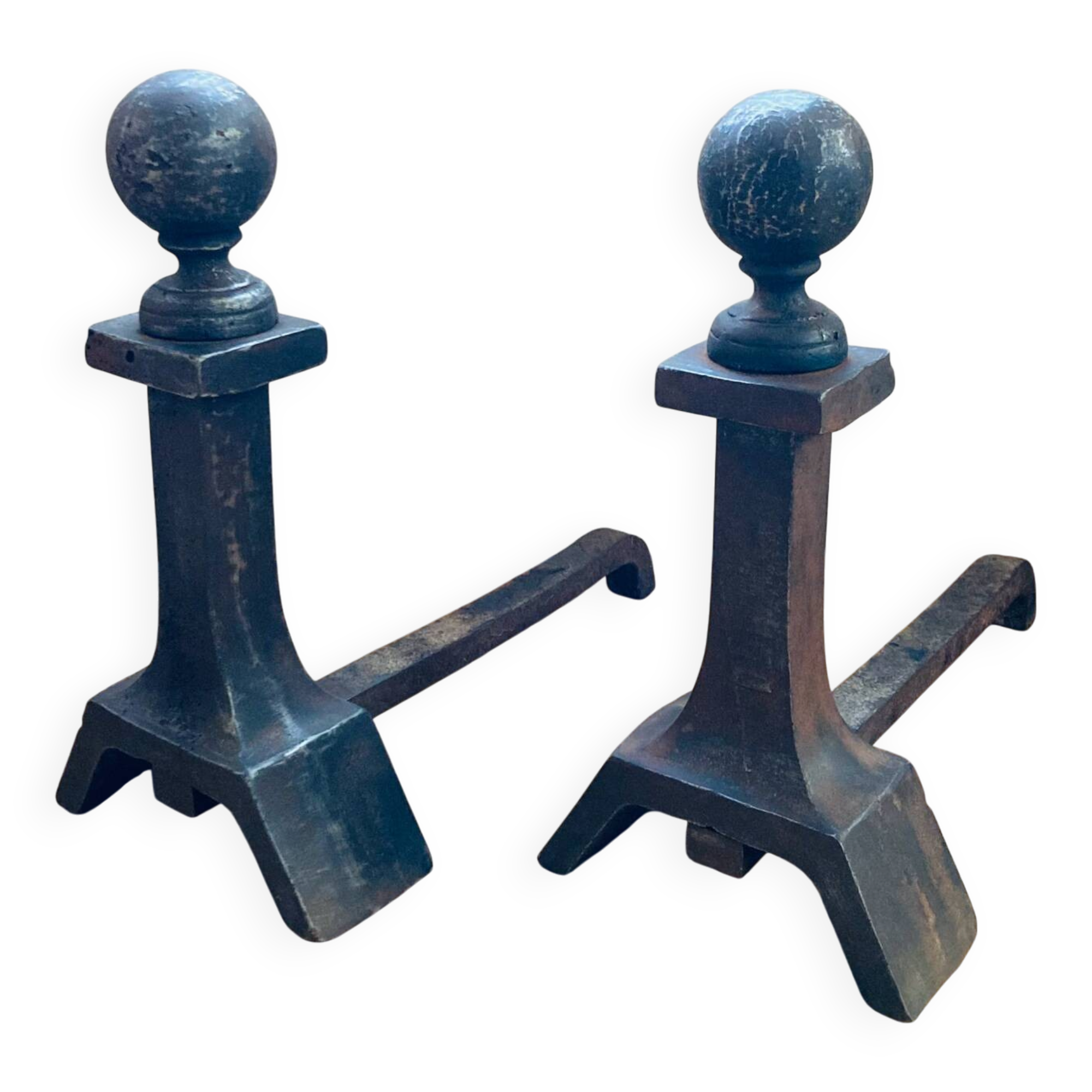 Pair of massive antique-style fire dogs in solid iron from the 20th century.