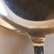 Silver cutlery set for 36 place settings and its ladle.