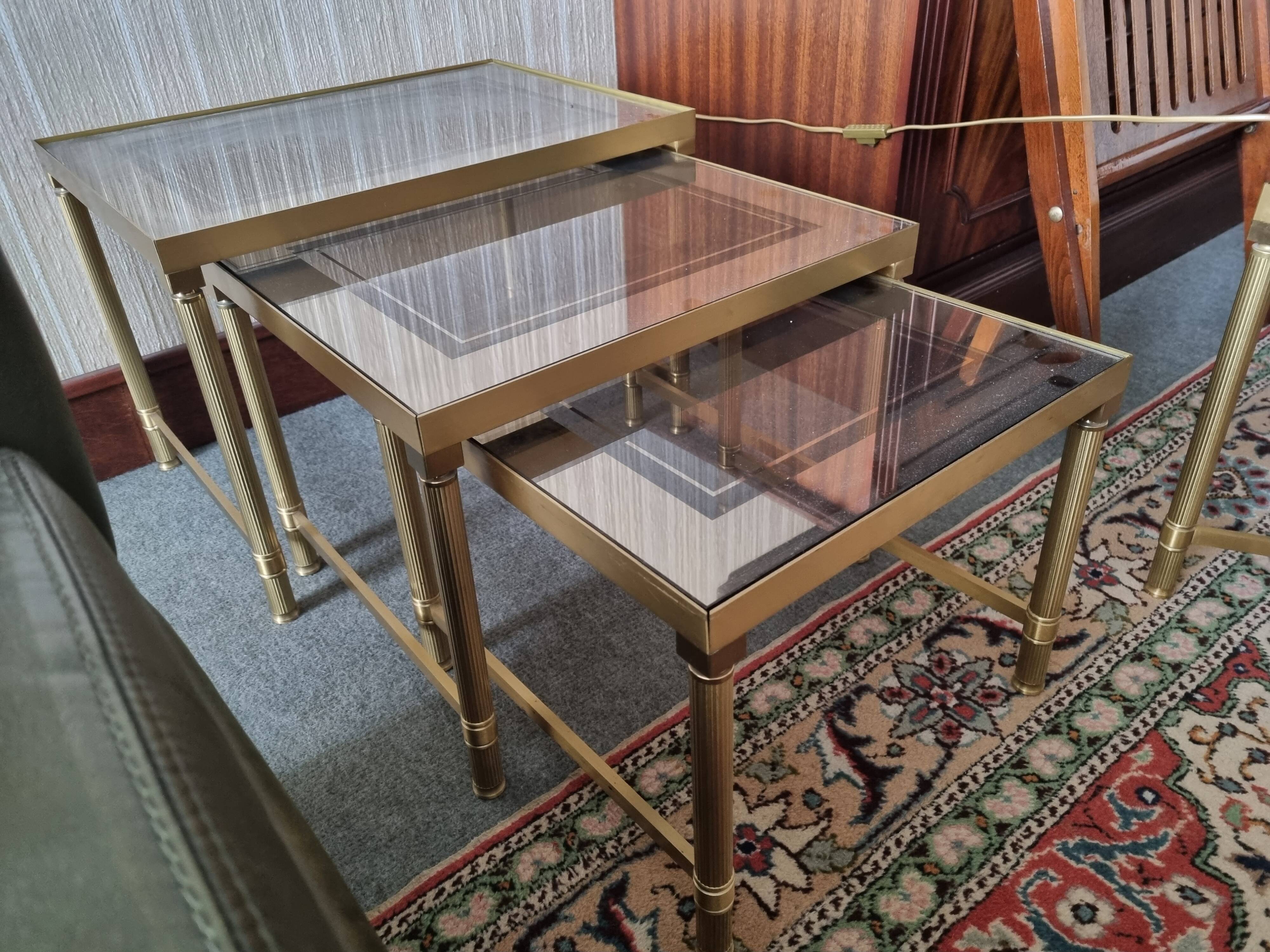 Set of three nesting tables in brass and glass