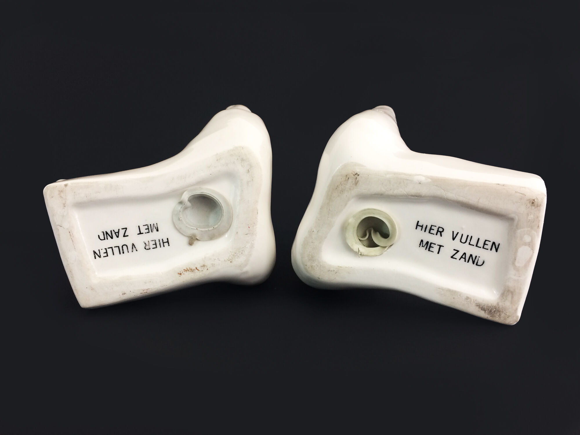 Pair of vintage handends in white ceramic to be used to comfort. Year 80