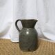 Blue glazed stoneware pitcher