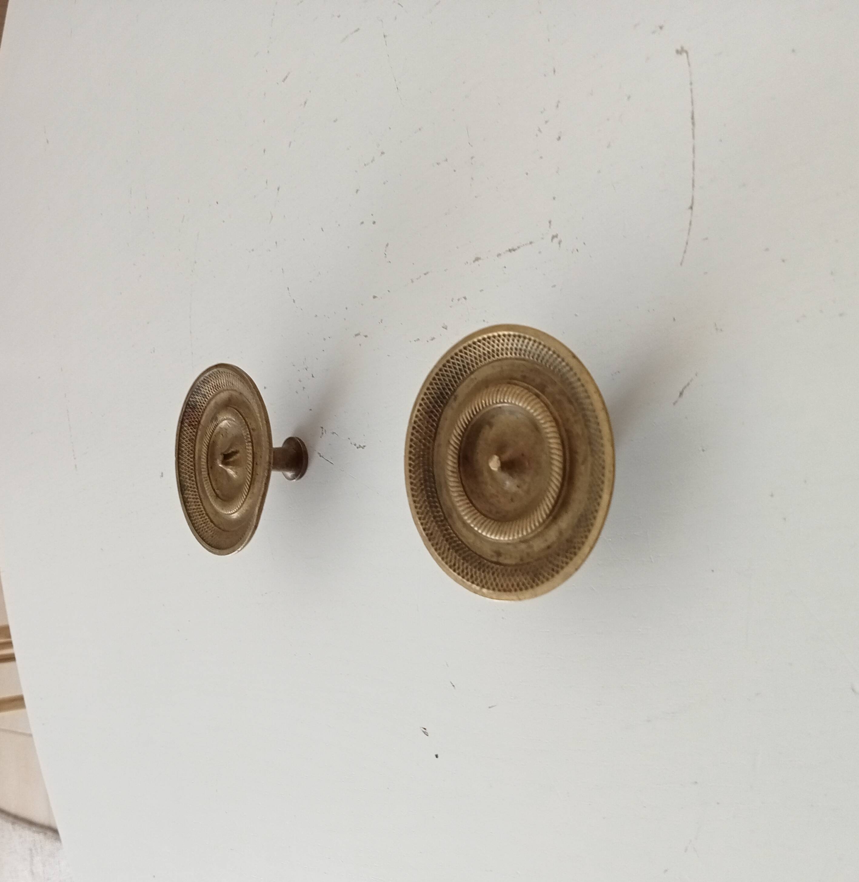 Pair of antique Empire furniture knobs in bronze from the 19th century.