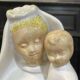 Virgin and child in quimper faience with ivory background by bel delecourt