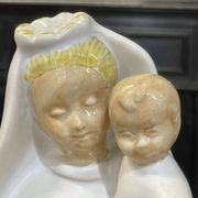 Virgin and child in quimper faience with ivory background by bel delecourt
