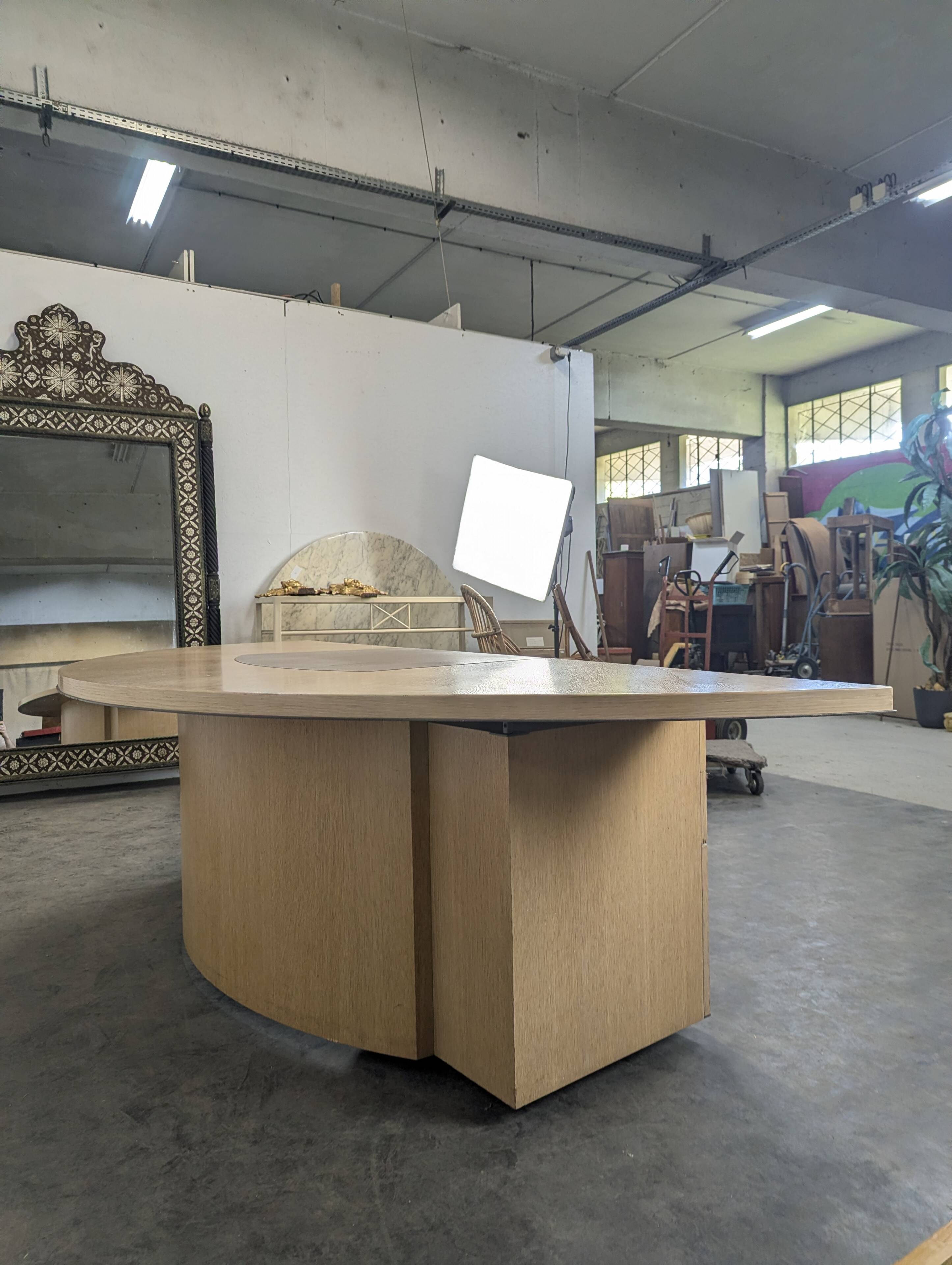 Large semicircular desk by André Putman published by Ecart International.